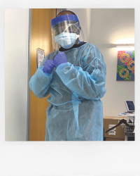 Nurse wearing PPE.